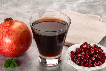 Sweet fresh pomegranate juice with fruit
