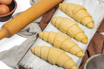 Frozen croissants, the process of making a traditional dessert. Comfort food, classic breakfast