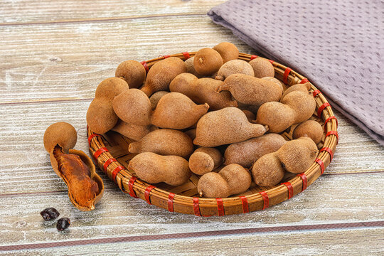 Tropical exotic Tamarind fruit heap