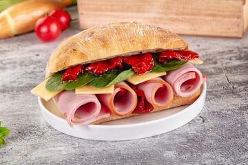 Ciabatta with mortadella, tomato, cheese and spinach