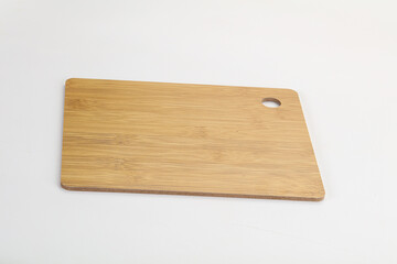 Wooden cutting board isolated on white background