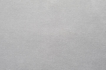 Cotton fabric texture showcases soft, neutral surface ideal for overlay.