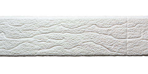 A textured, white surface featuring intricate patterns resembling waves or ridges.