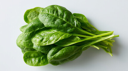 Fototapeta premium Fresh spinach leaves bunch isolated on white background healthy food ingredient for salad and cooking recipes