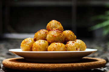 Cilok is a traditional food from Indonesia, made from tapioca, round shape, chewy textured. White...