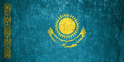 Kazakhstan State Flag. Dirty Kazakhstan flag on metal surface.