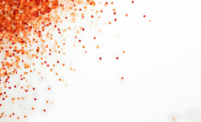 Red and orange confetti falling on a white background.