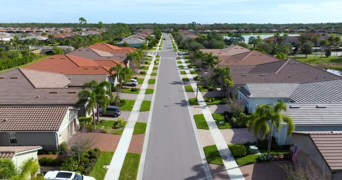 Rich neighborhood with expensive residential homes in southwest Florida. Wealthy suburban area