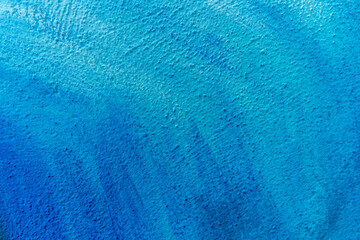 colorful wallpaper background painted on a street wall with brush and aerosol