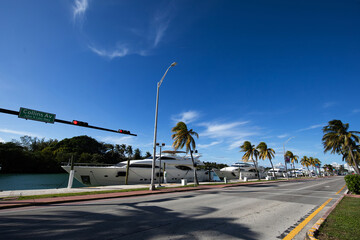 Yachts in a row on Collins Avenue Miami Beach 