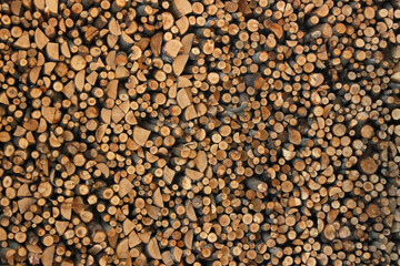 Pile of firewood texture background. Pile of firewood background.