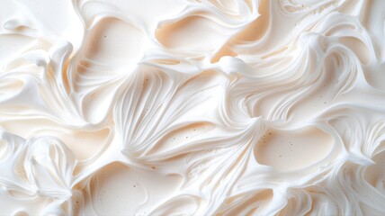 Obraz premium Close-up of creamy, textured whipped topping, displaying smooth swirls and rich patterns.