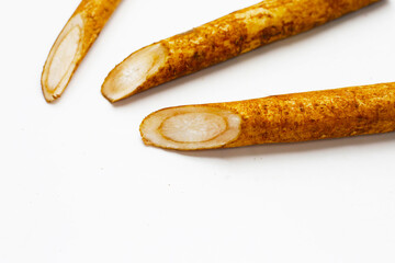 Burdock Root (Gobo) on white background.