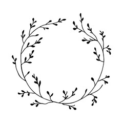 A delicate romantic floral wreath with tiny buds and flowers carefully arranged in a circle shape.