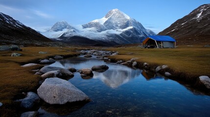 Serene mountain valley campsite. Crystal-clear stream reflects towering peaks, a small tent nestled in the meadow.  Tranquil alpine landscape