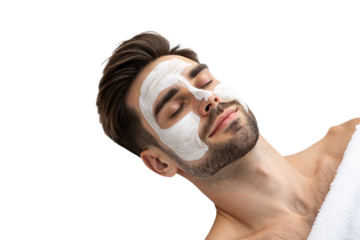 A man relaxing with white facial mask on, eyes closed, wrapped in towel, enjoying skincare treatment, isolated on a transparent background