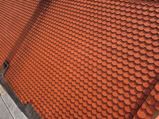Red tile roof covering building