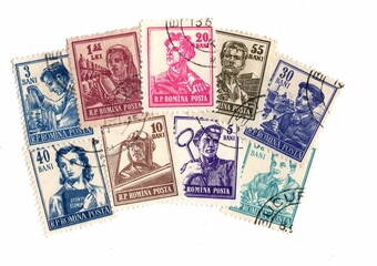 Vintage postage stamps from Romania isolated on a white background.