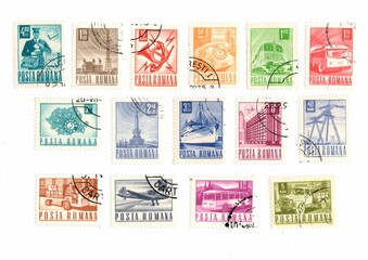 Vintage postage stamps from Romania isolated on a white background.