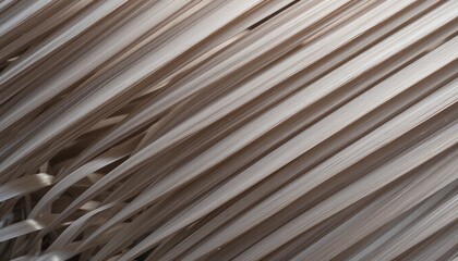 Artistic display of beige ribbons studio space abstract photography bright lighting close-up viewpoint textural exploration