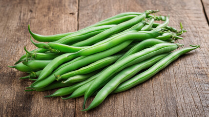 Obraz premium Fresh green beans arranged in neat piles on a rustic table, with natural light highlighting their texture and freshness. 