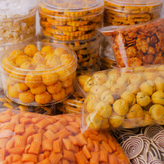 Kue lebaran, Various Eid cakes in packaging, pineapple tart, snowball cookies, butter cookies,...