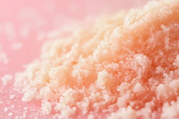 Fototapeta premium Macro photography of small crystals of exfoliating sugar lip scrub resting on a pink surface