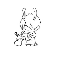 A boy is holding a rabbit