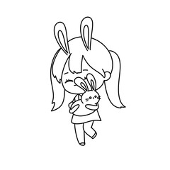 A girl is holding a rabbit
