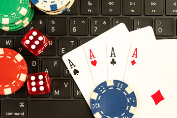 Image features gambling-related objects, including poker cards, dice, a roulette wheel, and chips, possibly depicting online or virtual casino games