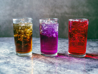 A lot of Soft drinks in colorful and flavorful glasses on the table,Glasses with sweet drinks with...