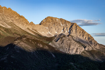Snowy mountain landscape. Sunset on the mountain.