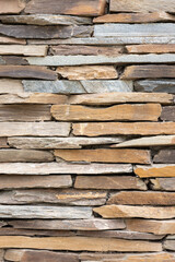 Decorative stones for walls. Pastel-colored stones with irregular shapes.