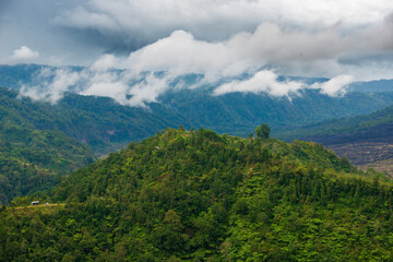 Bali mountain landscape with dramatic rain clouds