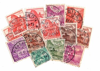 Vintage postage stamps from Switzerland isolated on a white background.