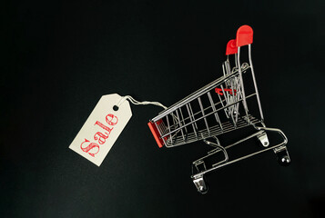 Shopping cart with a sale tag on it