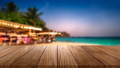 Fototapeta premium Empty wood table top and blurred summer beach bar in tropical resort banner background - can used for display or montage your products