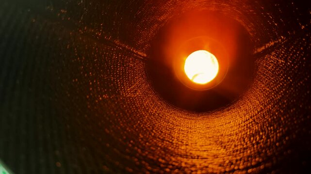 Interior view of a powerful rocket engine showcasing fiery combustion chamber and intricate design elements