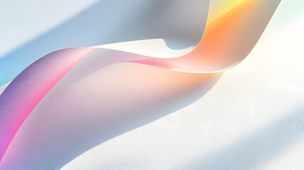 Abstract pastel paper swirls with light and shadow create a dreamy, colorful design.