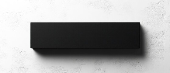A rectangular black shape on a white textured background is shown
