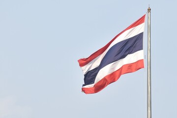 tree colors national Thailand flag red mean nation with white mean religon and blue mean majesty king flowing from wind blow on pole in sky background