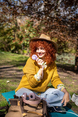 A sunny outdoor experience involving relaxation with a carefree and playful woman