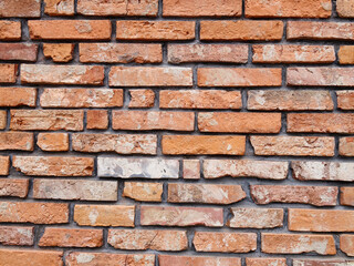 Element of a facade modern building from red bricks, background