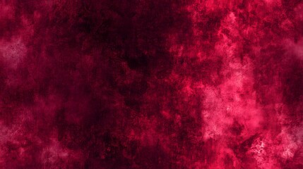 Fototapeta premium A rich, deep crimson abstract background with mottled texture.