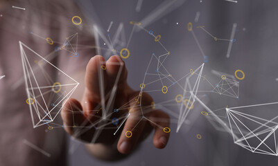 Abstract image of hand interacting with a digital network, representing connection and technology.