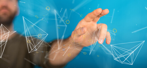 Abstract image of a hand interacting with a digital network.  Perfect for tech, innovation, and...