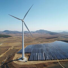 Modern renewable energy landscape with photovoltaic solar panels and wind turbines generating clean electricity. Sustainable green power solutions for eco-friendly future