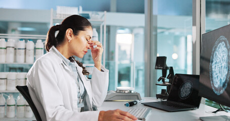 Scientist, woman and headache with computer for biology, stress or medical analysis anxiety....