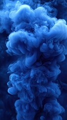 Deep blue ink swirling in abstract cloud-like form