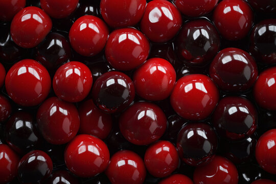 A tempting cluster of glistening red orbs, a jewel-toned mosaic of deep, succulent delights.